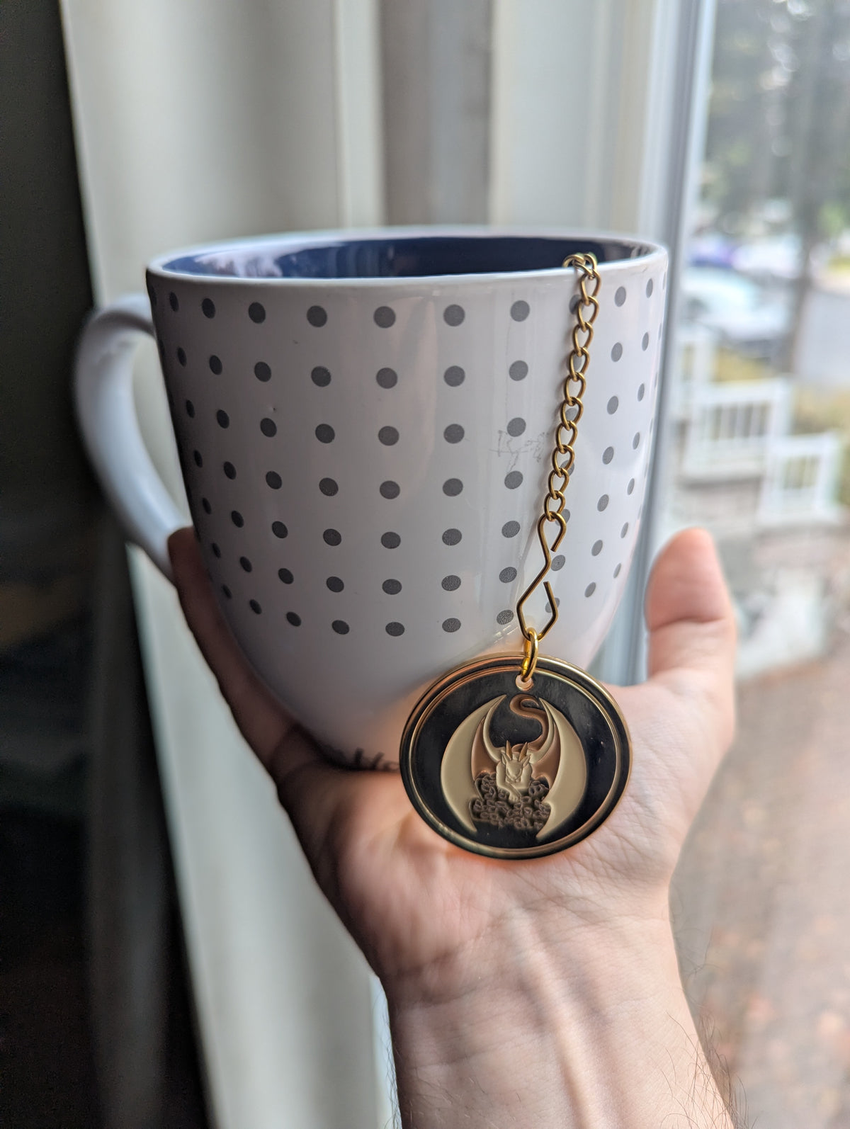 Tea ball infuser with Torréfactions du dragon medal